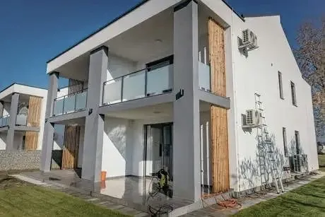Porches, breezeways, handrails, entryways — the surfaces every visitor touches.